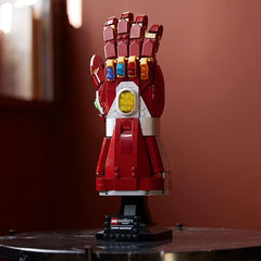 Red Marvel Infinity Saga Nano Gauntlet shown on a clean white background.
Features colorful Infinity Stones and detailed metallic-style accents.
Mounted on a sturdy black display stand with a Marvel plaque.
Perfect for collectors and superhero-themed displays.