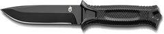 Black knife with a textured handle on a black background