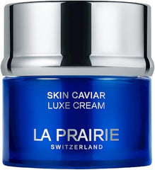 Blue jar of La Prairie Skin Caviar Luxe Cream with silver lid on a white background