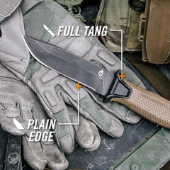 Knife with full tang and plain edge on tactical gear