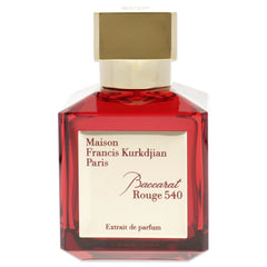 Maison Francis Kurkdjian perfume bottle with red body and gold cap on a white background