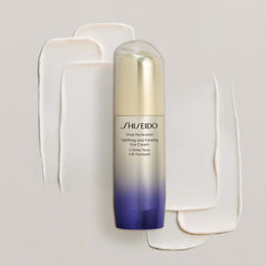 Shiseido eye cream bottle with ombre design on a light gray background