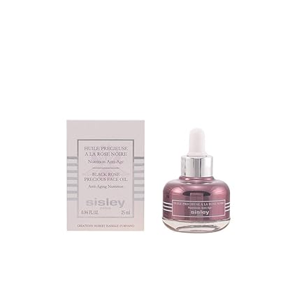 Sisley facial oil with packaging on a white background