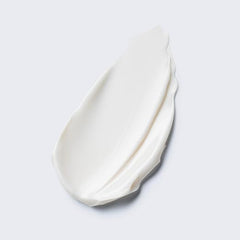 Swatch of Estée Lauder Resilience Multi‑Effect Night cream texture on light surface