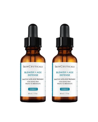 Two bottles of SkinCeuticals Blemish + Age Defense serum on a white background