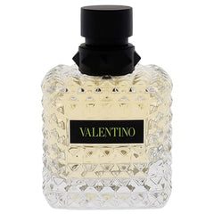 Valentino perfume bottle with black cap on a white background
